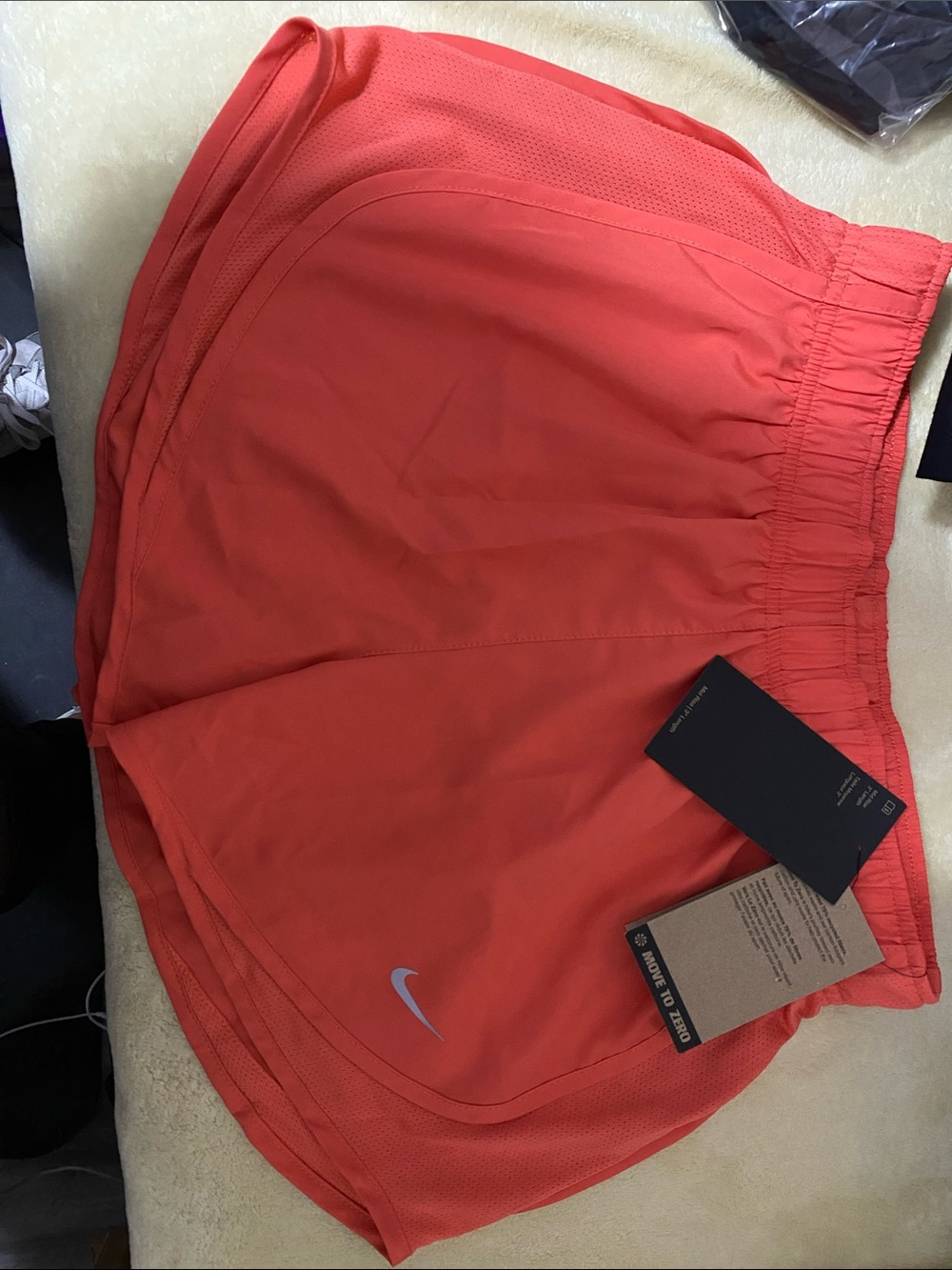 Nike Women’s Coral Athletic Shorts with Reflective Swoosh